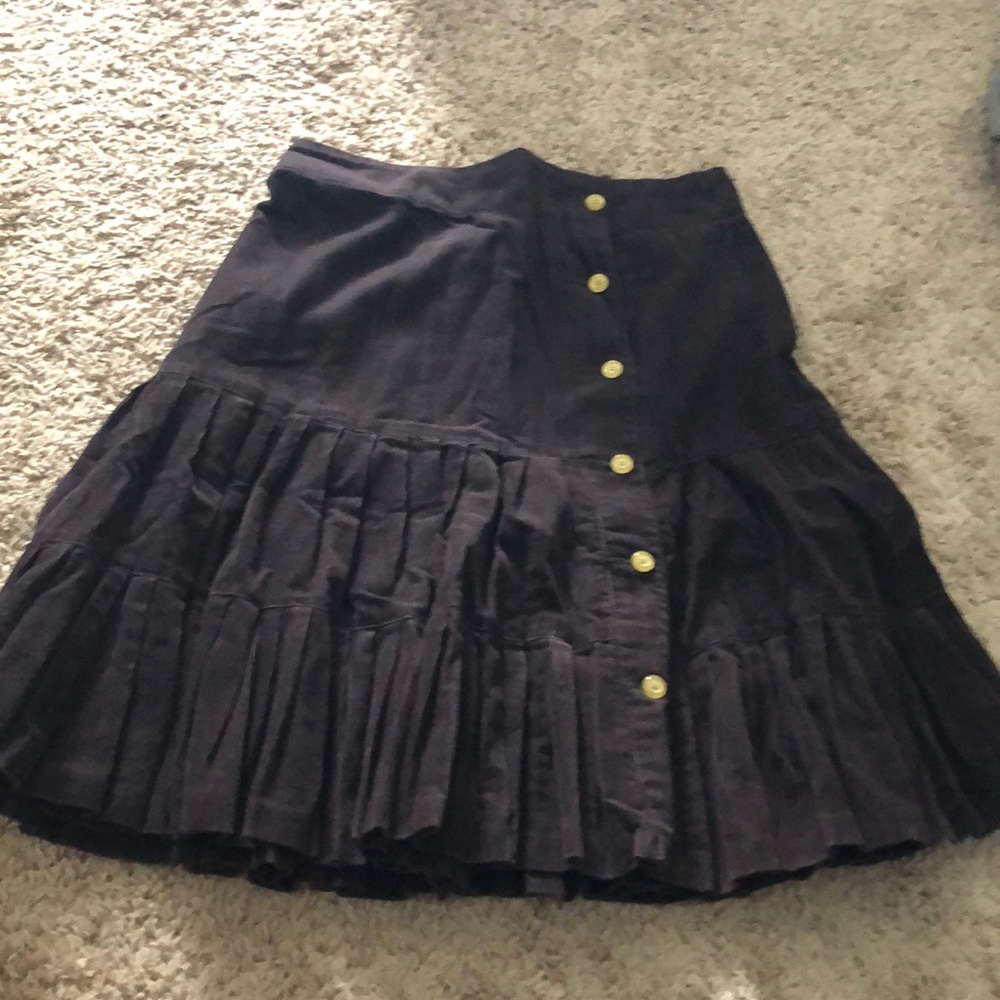 Brown corduroy skirt with pleats and buttons